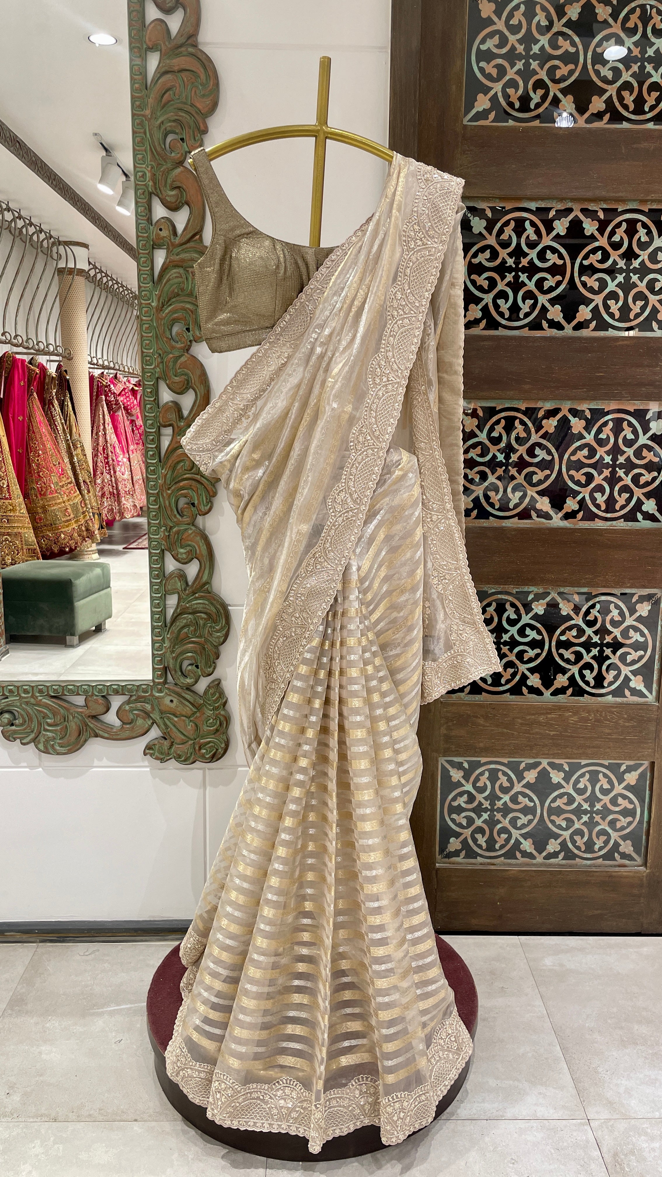 Gold and silver tissue saree with embellishments