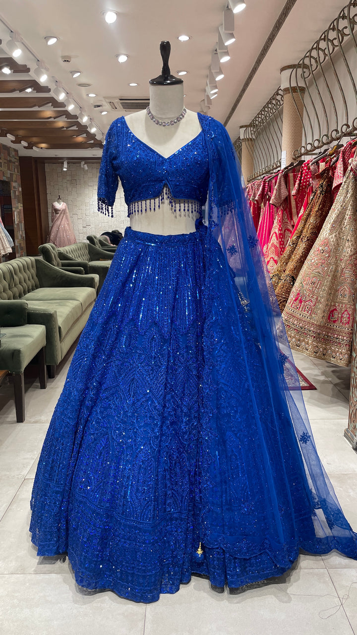 Royal blue net lehenga with threadwork and sequin embellishments