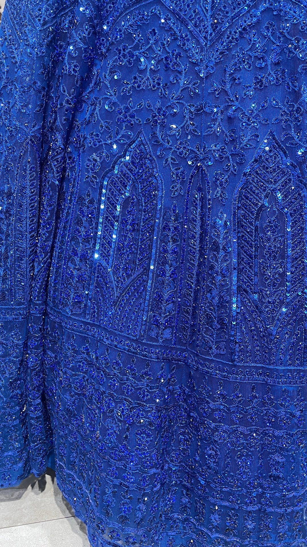 Royal blue net lehenga with threadwork and sequin embellishments