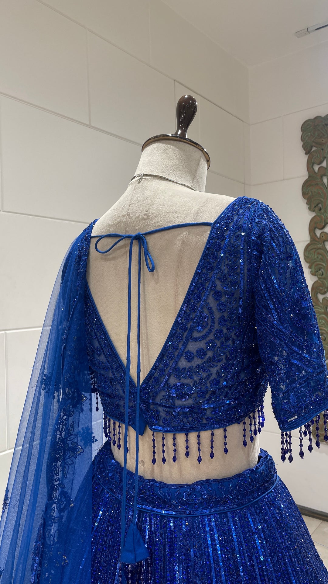 Royal blue net lehenga with threadwork and sequin embellishments