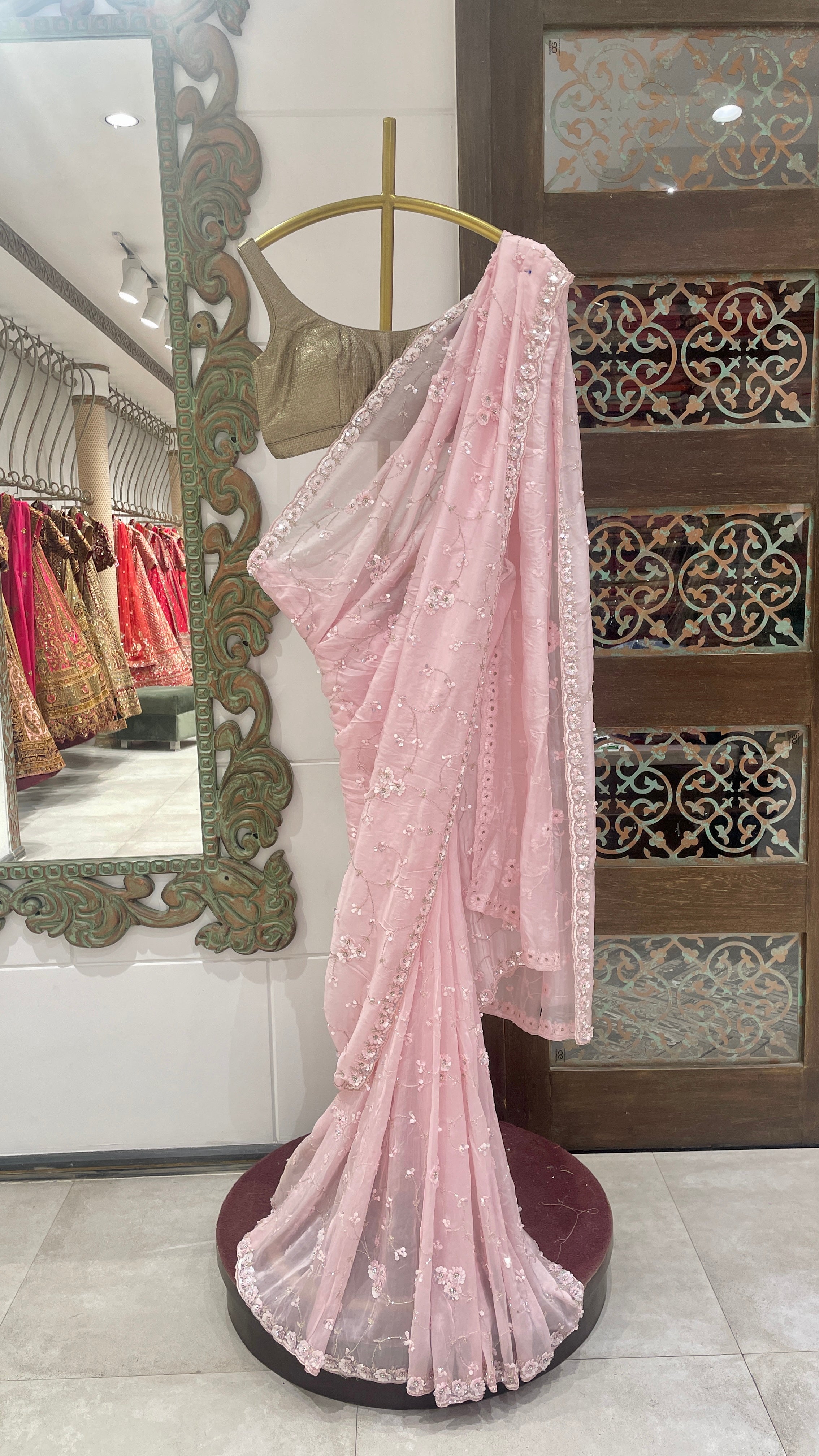 Pink crepe saree with embellishments