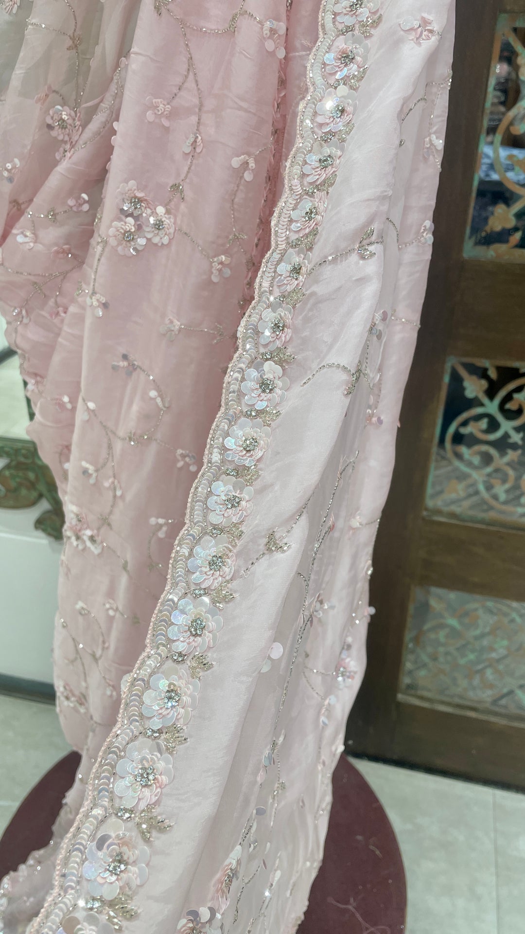 Pink crepe saree with embellishments