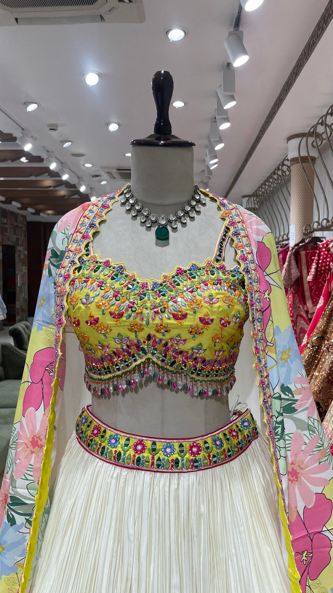 Floral cape style lehenga with multicolour Mirrorwork