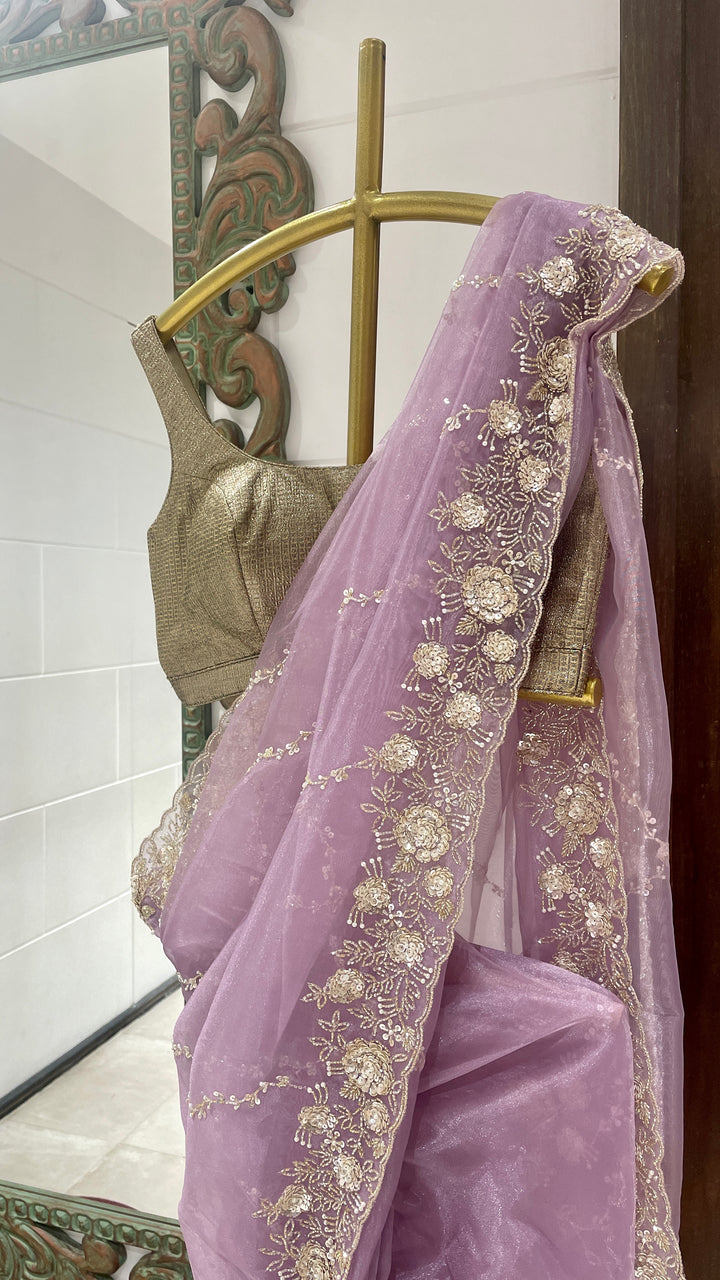 Purple organza saree with cutdana embellishments