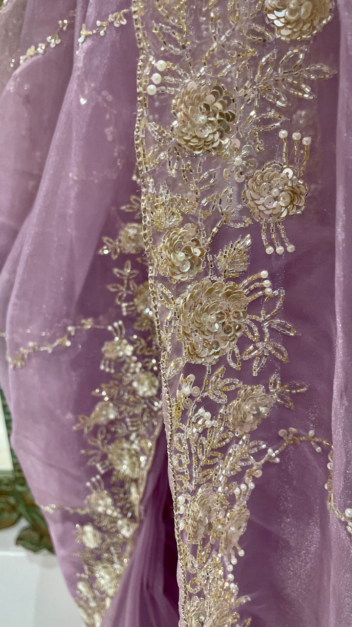 Purple organza saree with cutdana embellishments