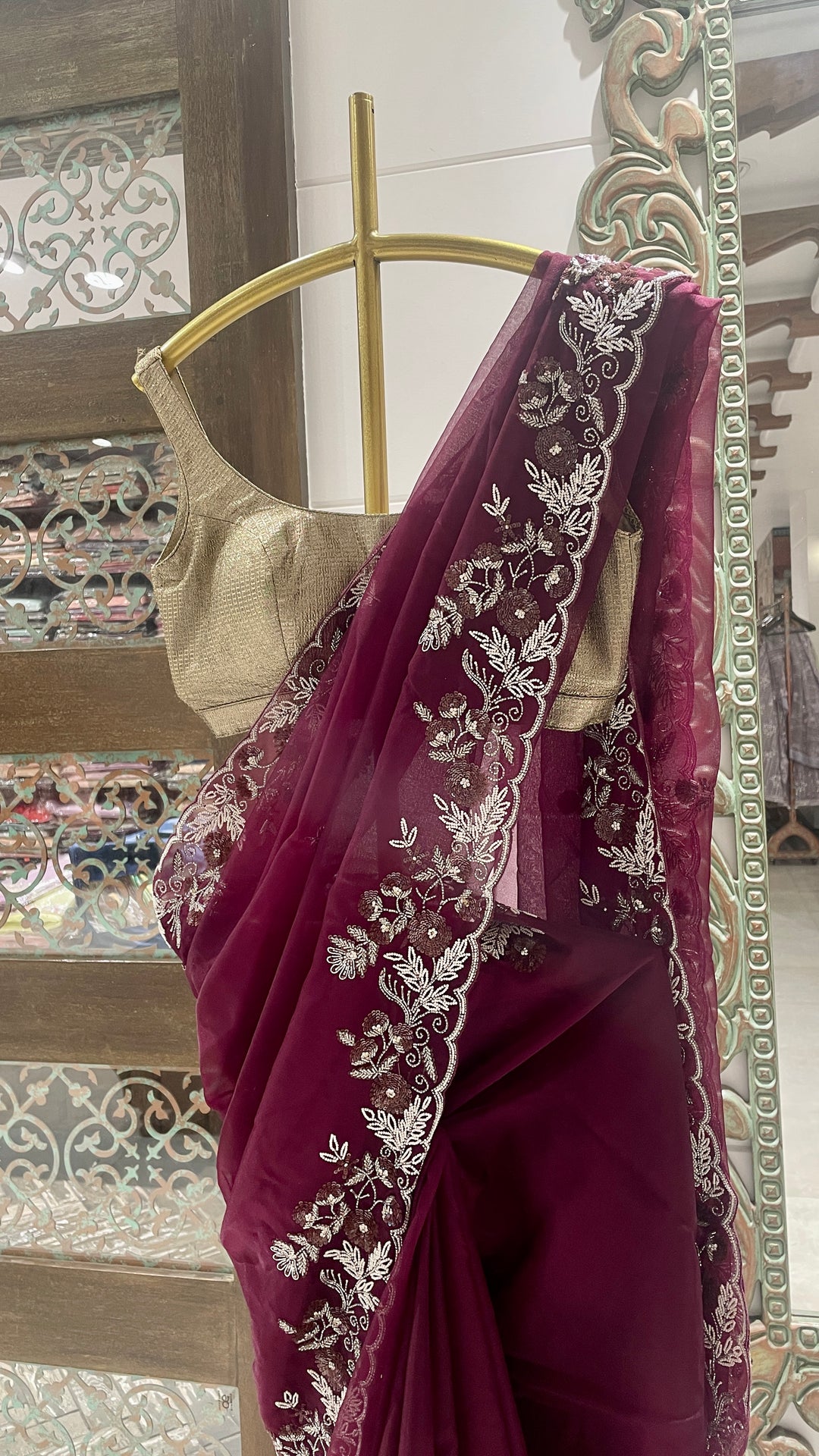 Violet organza saree with embellishments