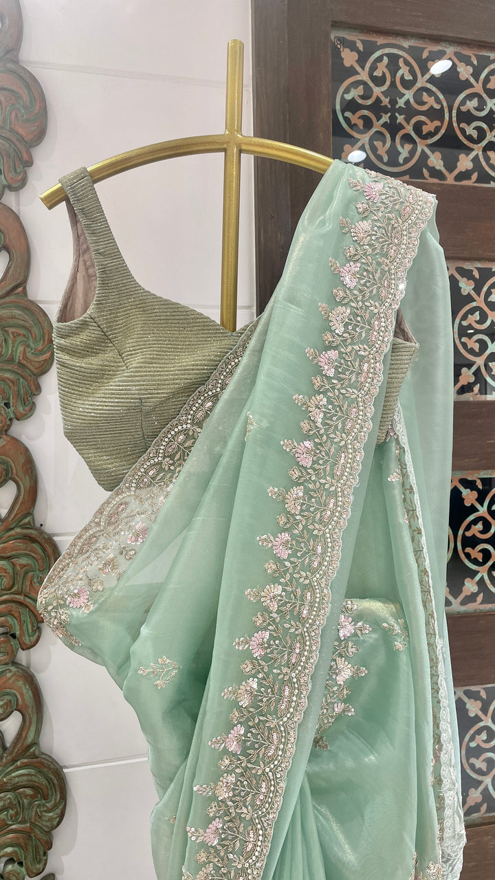 Green organza saree with cutdana embellishments