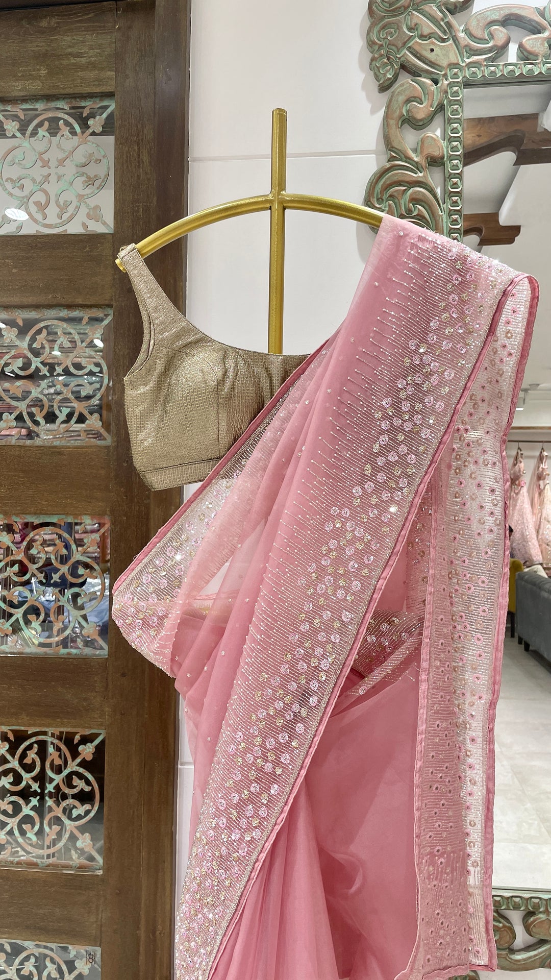 Pink Organza saree with sequin embellishments