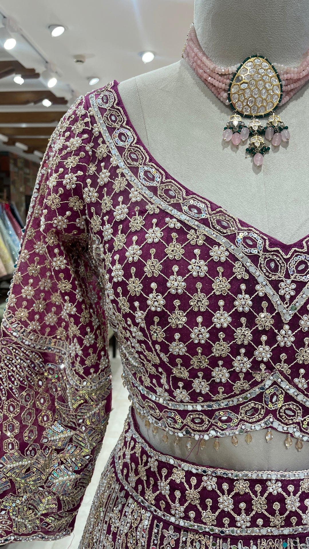 Wine colour lehenga with gold and silver sequence work