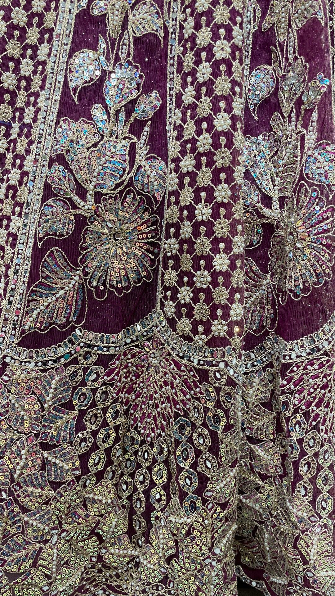 Wine colour lehenga with gold and silver sequence work