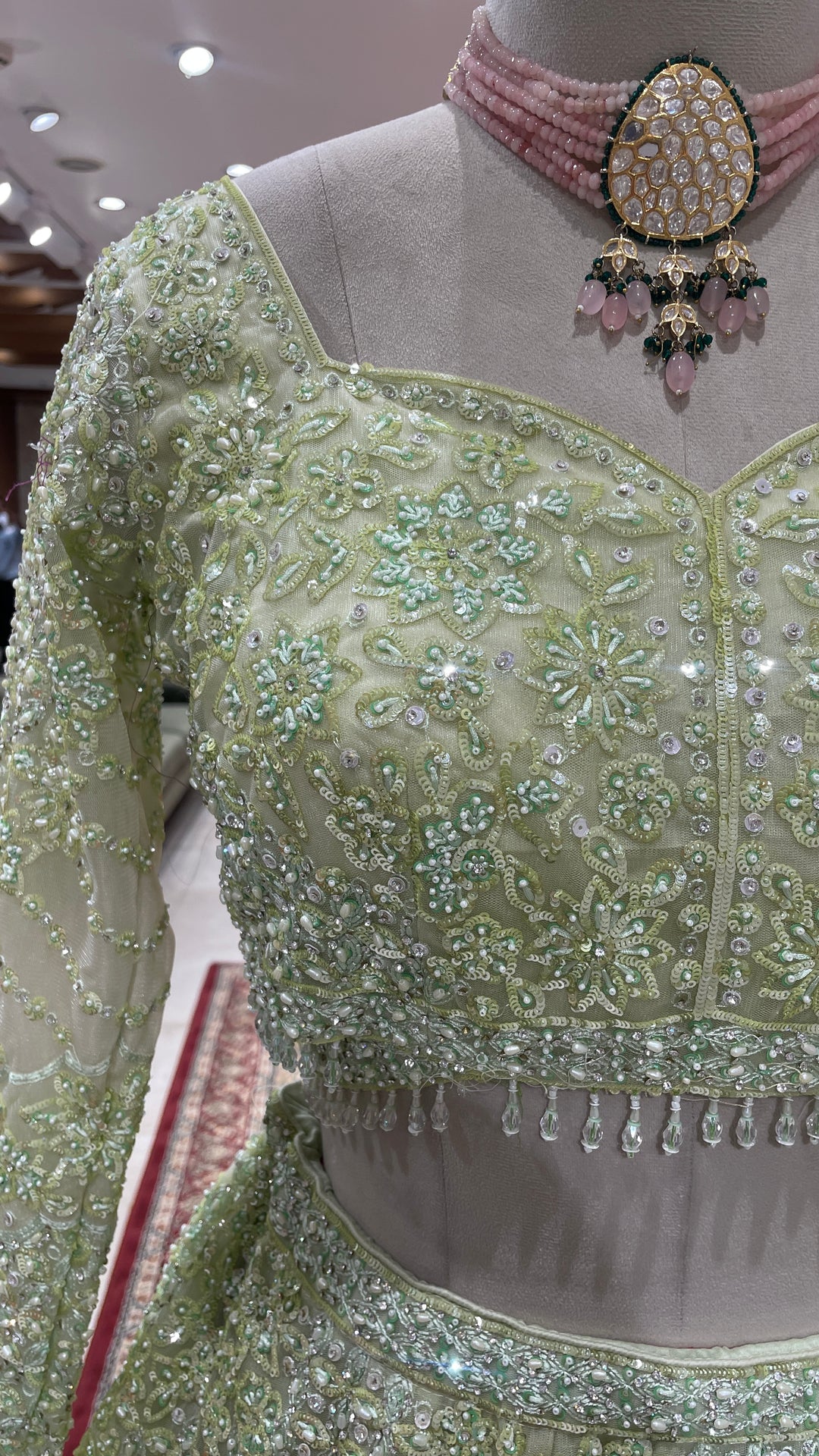 Pista Green colour Lehenga with sequins and pearlwork