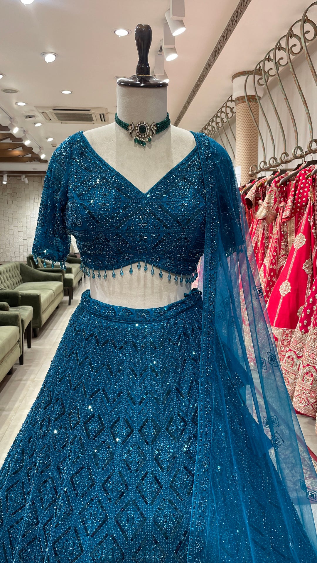 Teal blue Lehenga with sequins work