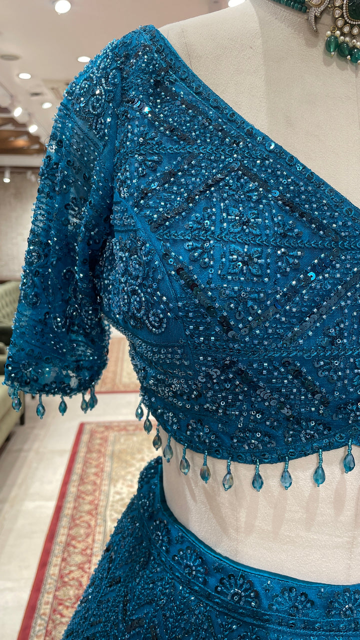 Teal blue Lehenga with sequins work