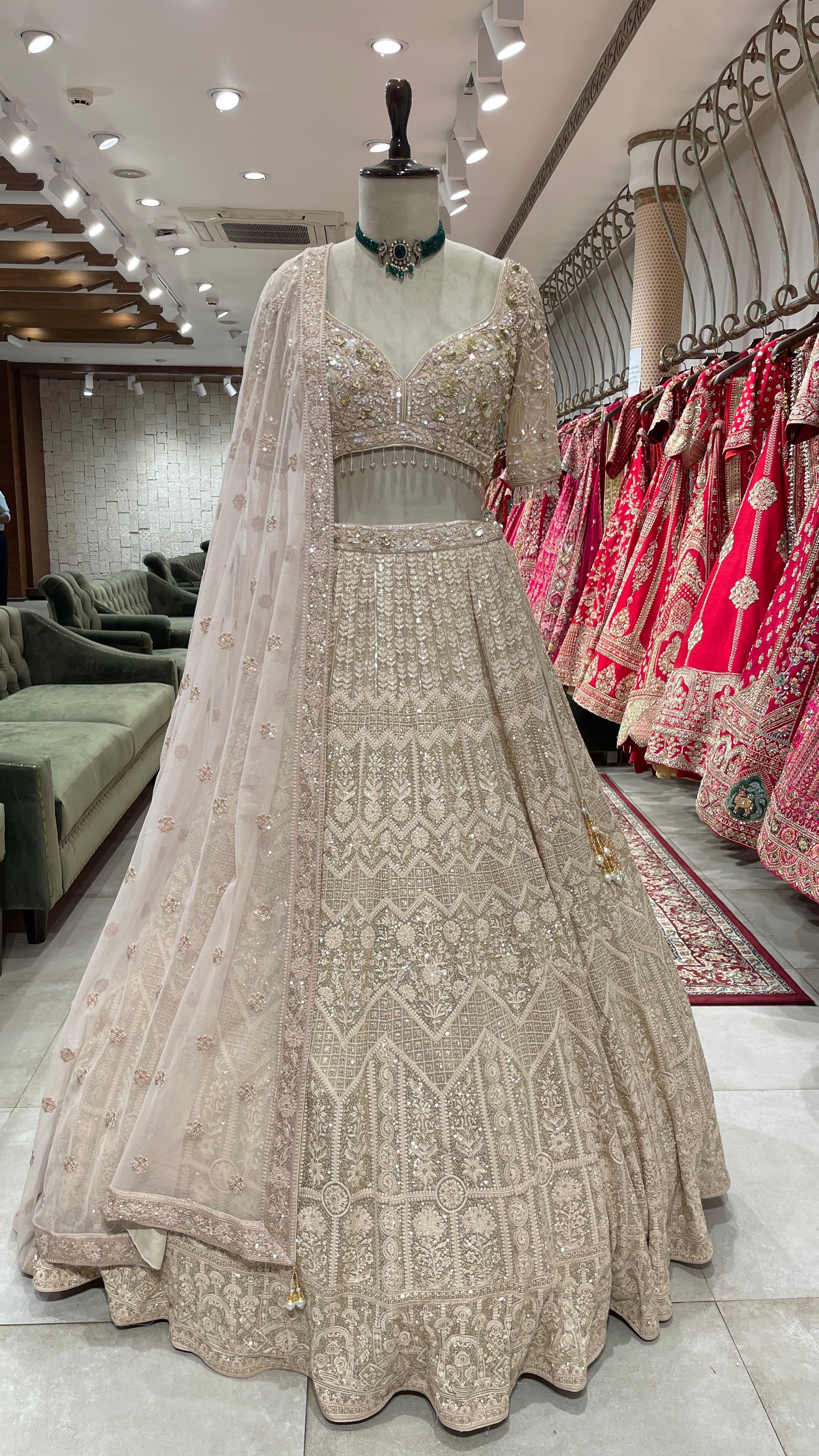 Beige colour lehenga with white and gold thread and sequins work