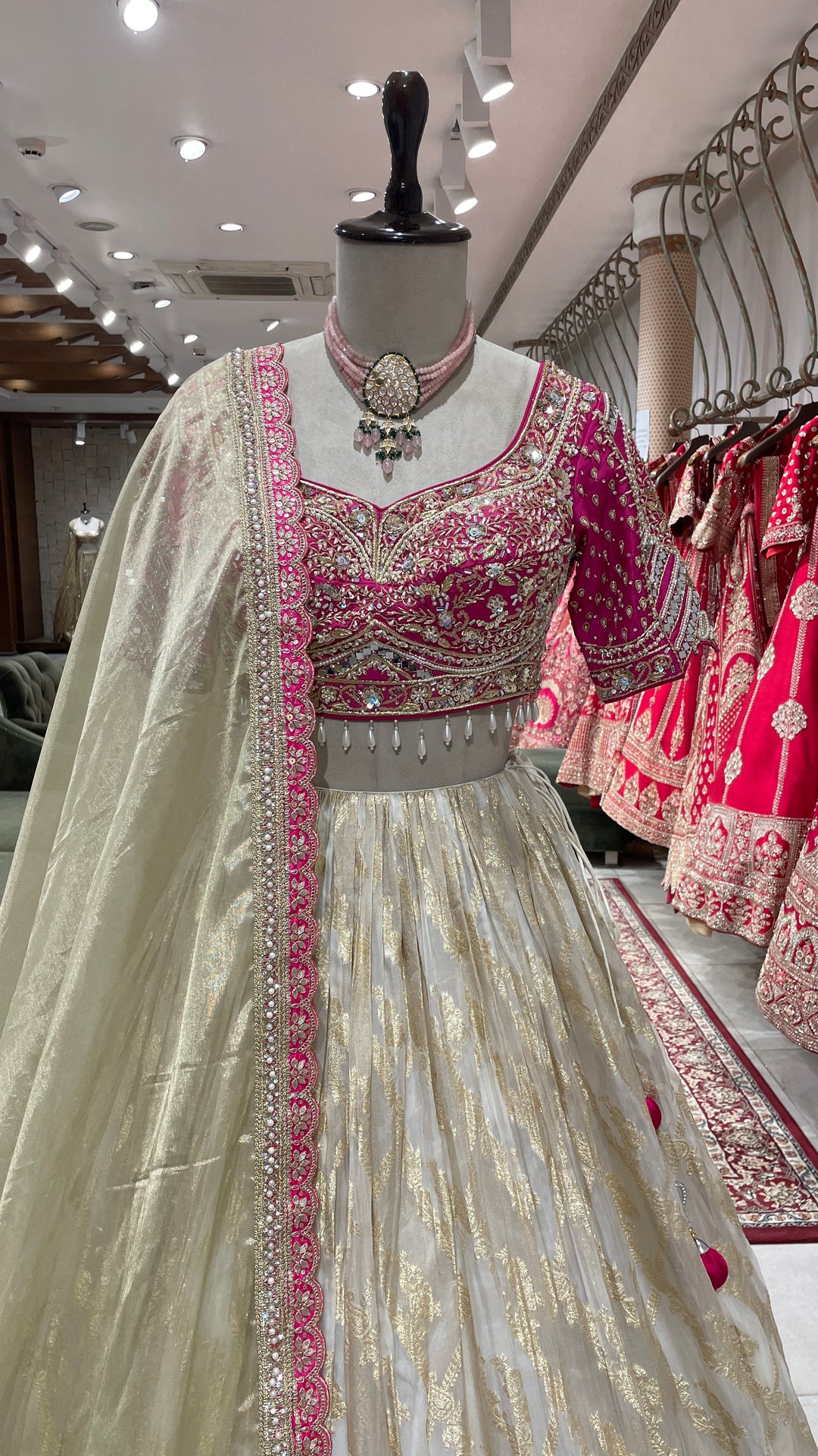 Gold colour lehenga with pink beadwork