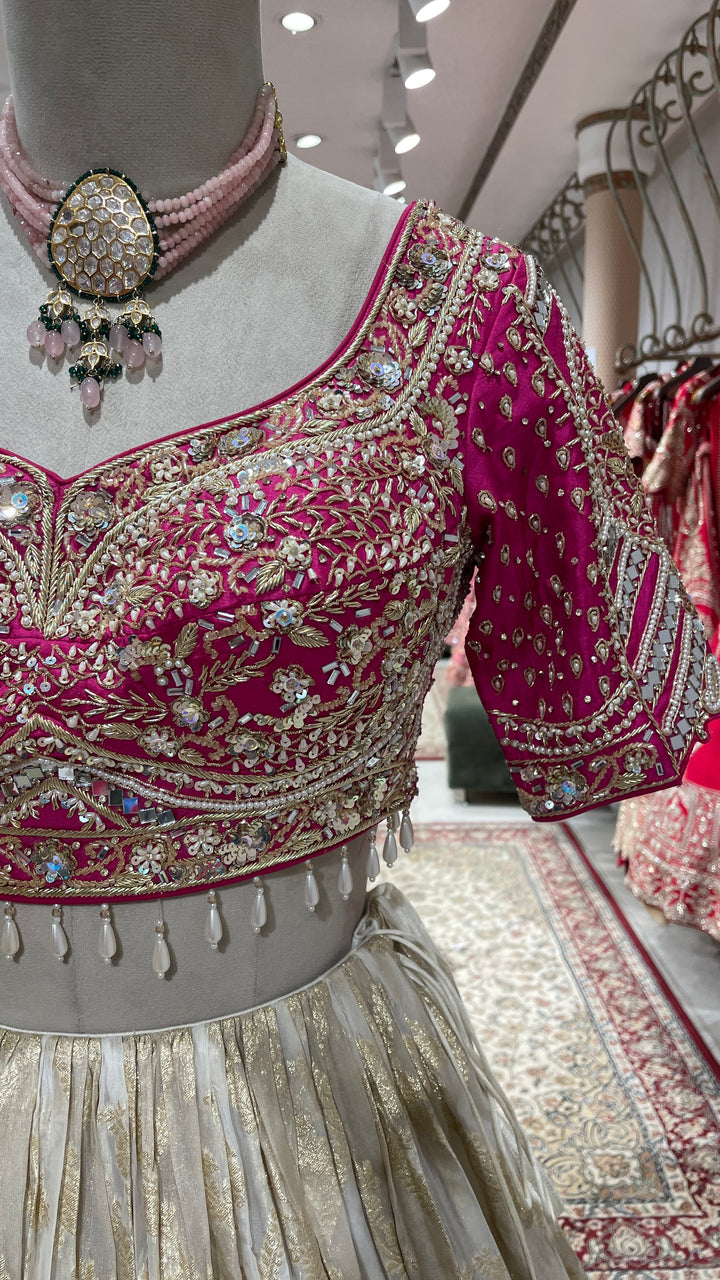 Gold colour lehenga with pink beadwork