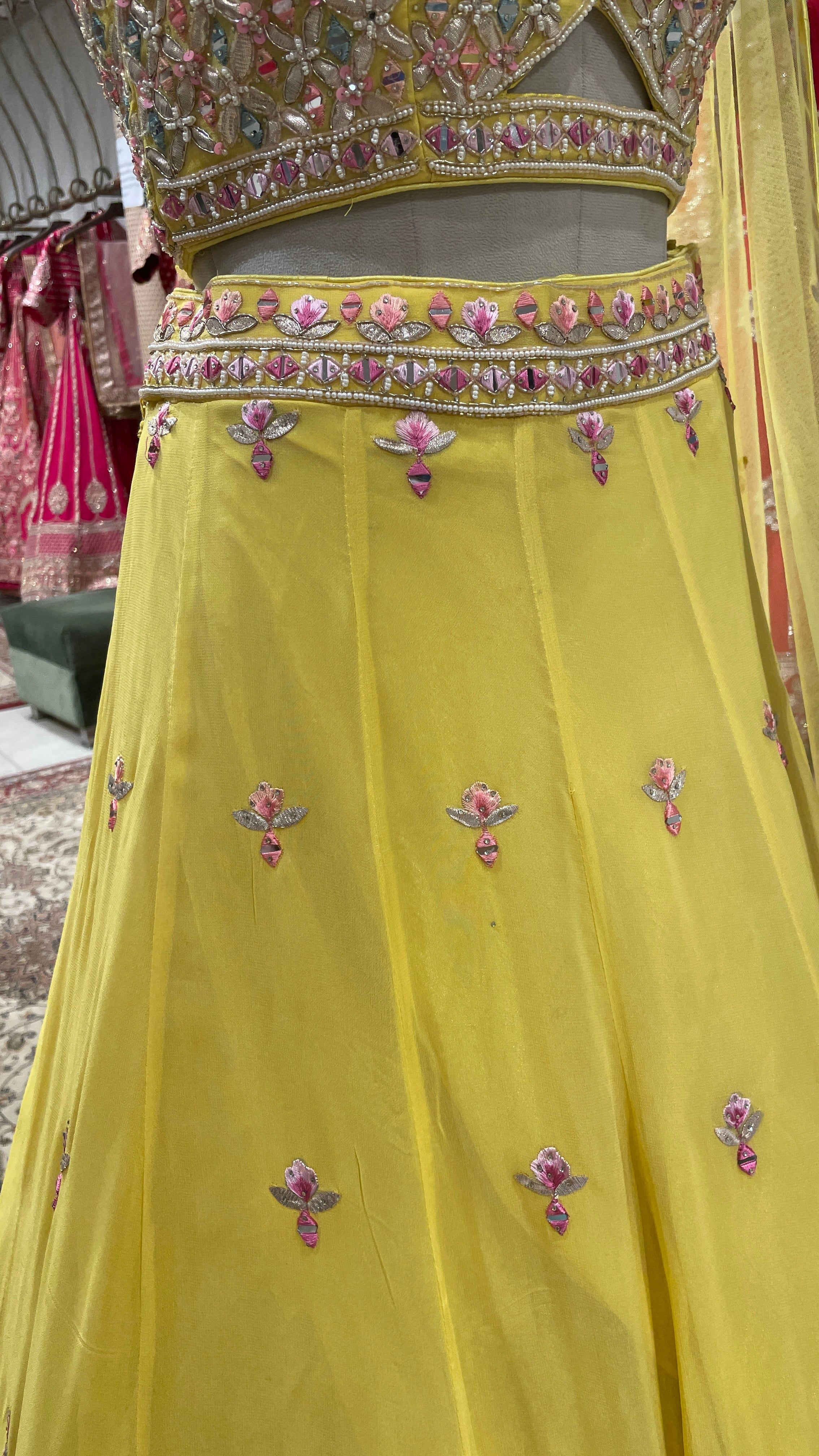 Yellow Georgette lehenga with floral motifs