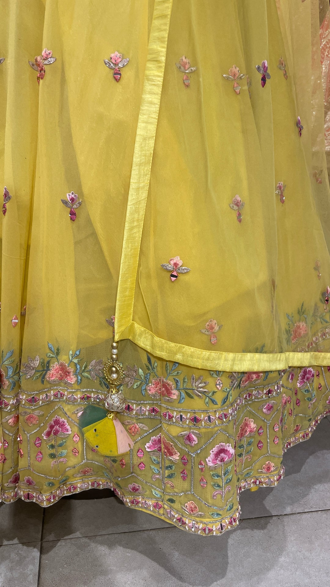 Yellow Georgette lehenga with floral motifs