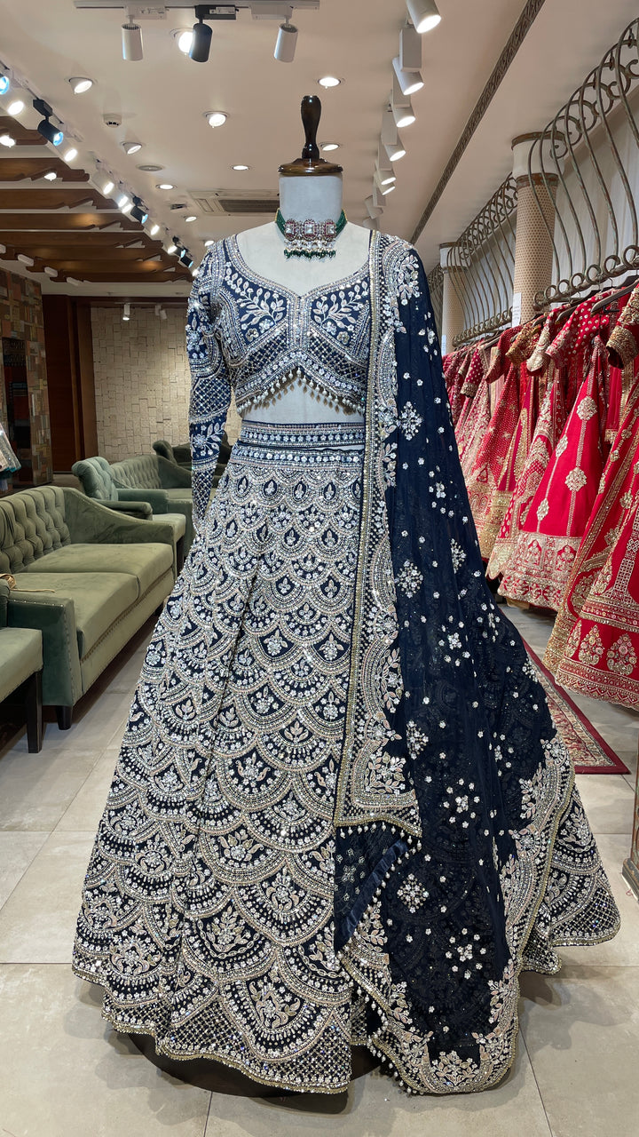 Royal blue silk lehenga with sequins and floral motifs