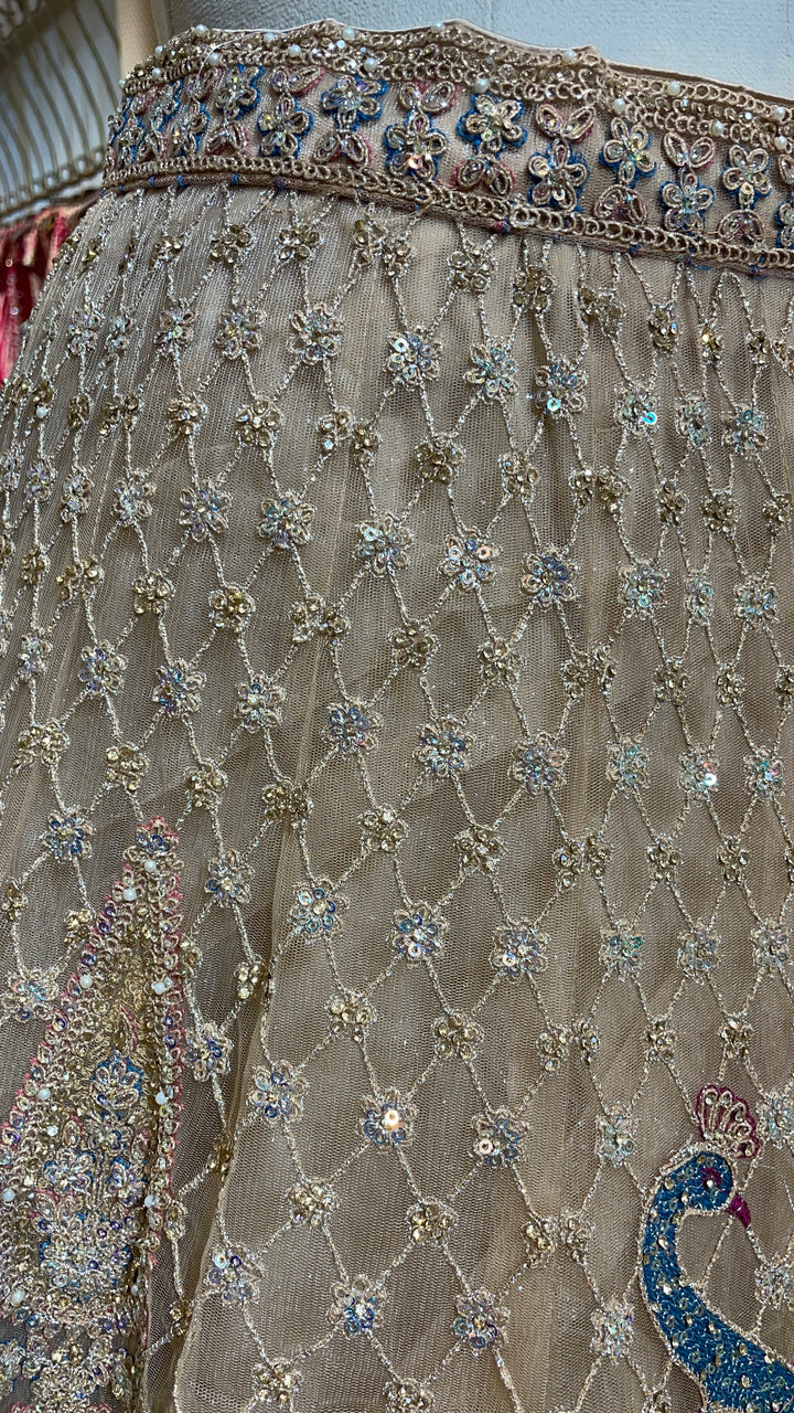 Gold multicolour net lehenga with peacock motifs