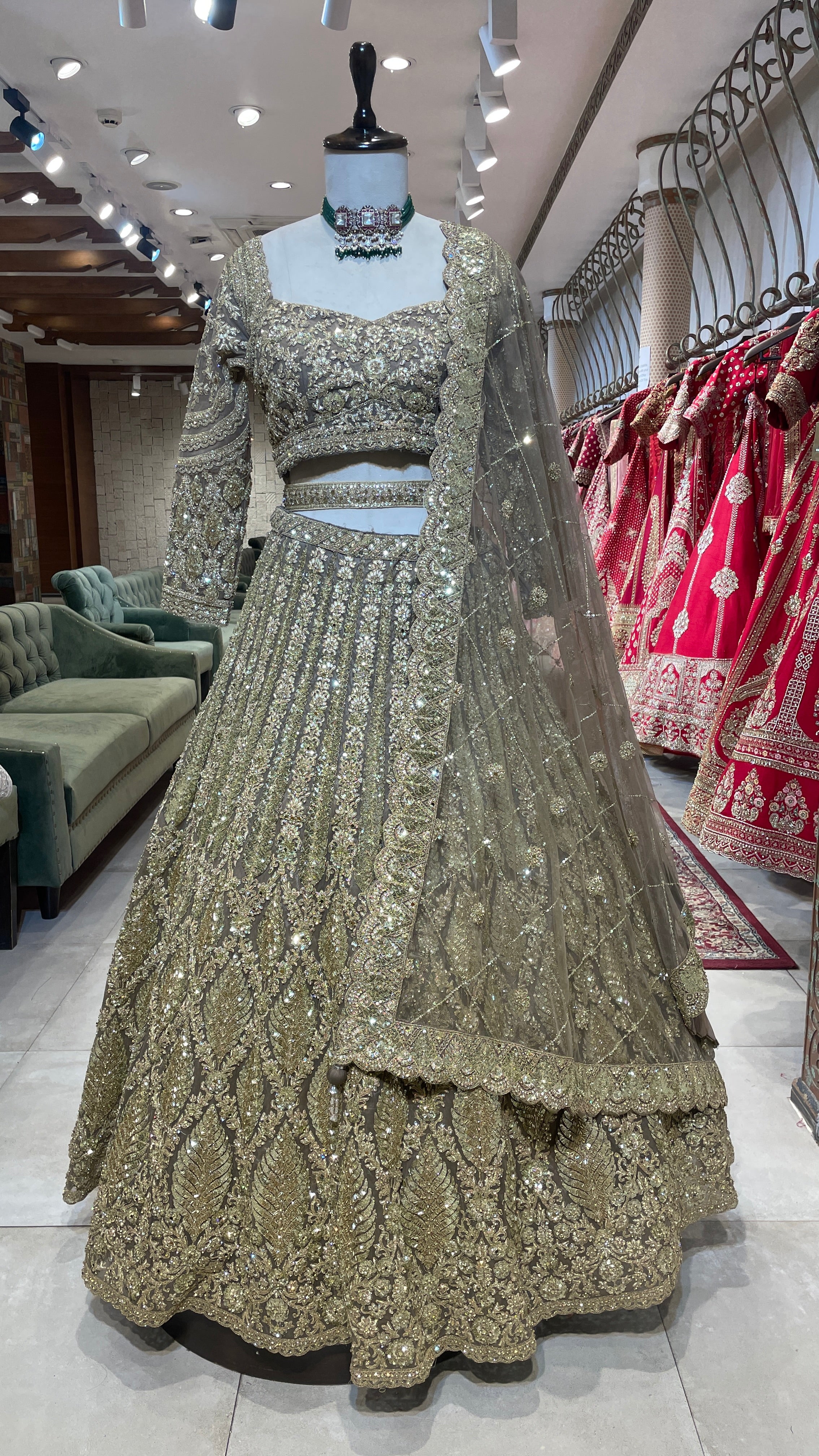 Net lehenga with gold embellishments