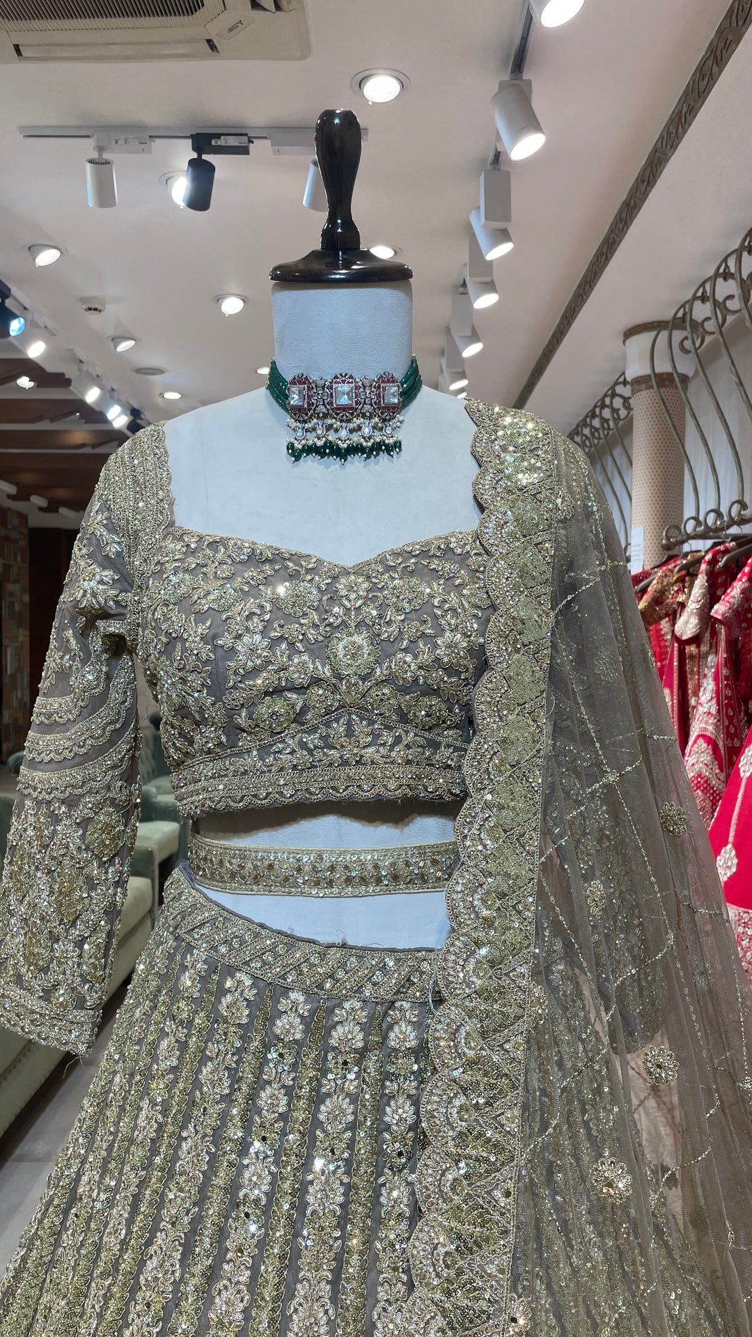 Net lehenga with gold embellishments