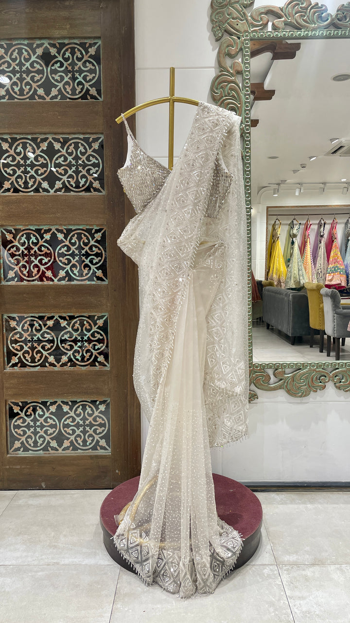 Ivory saree with rhinestones embellishment