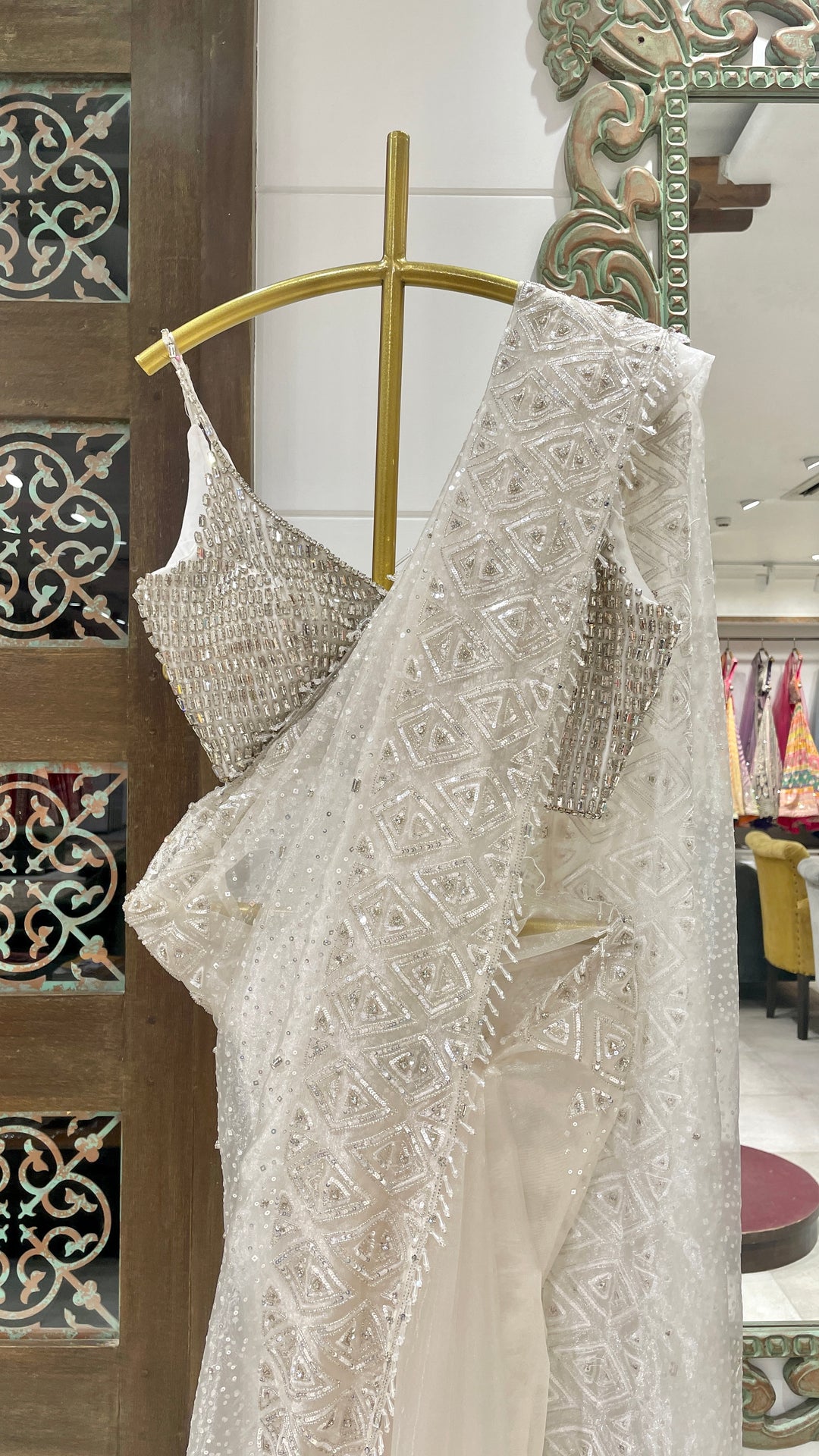 Ivory saree with rhinestones embellishment