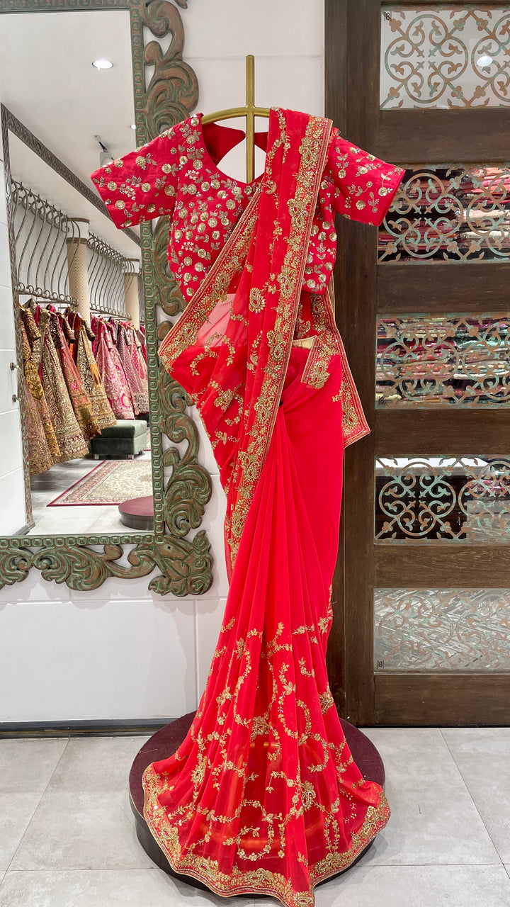 Red saree with gold embellishment