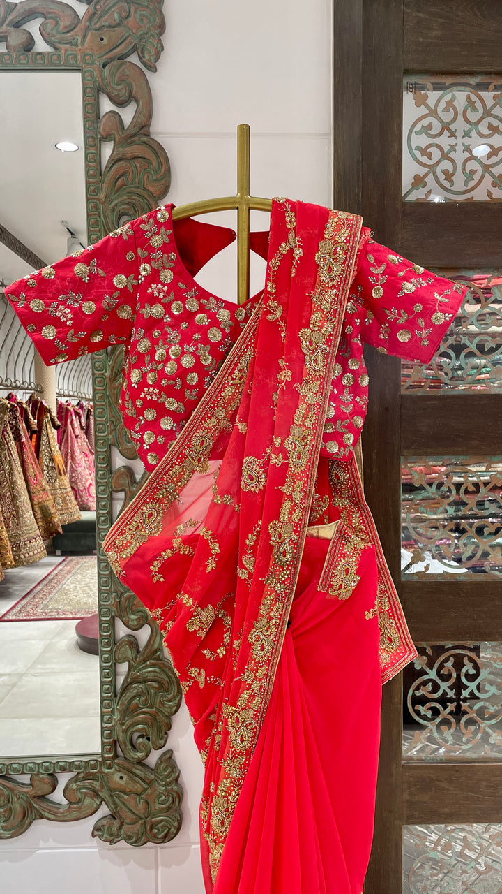 Red saree with gold embellishment