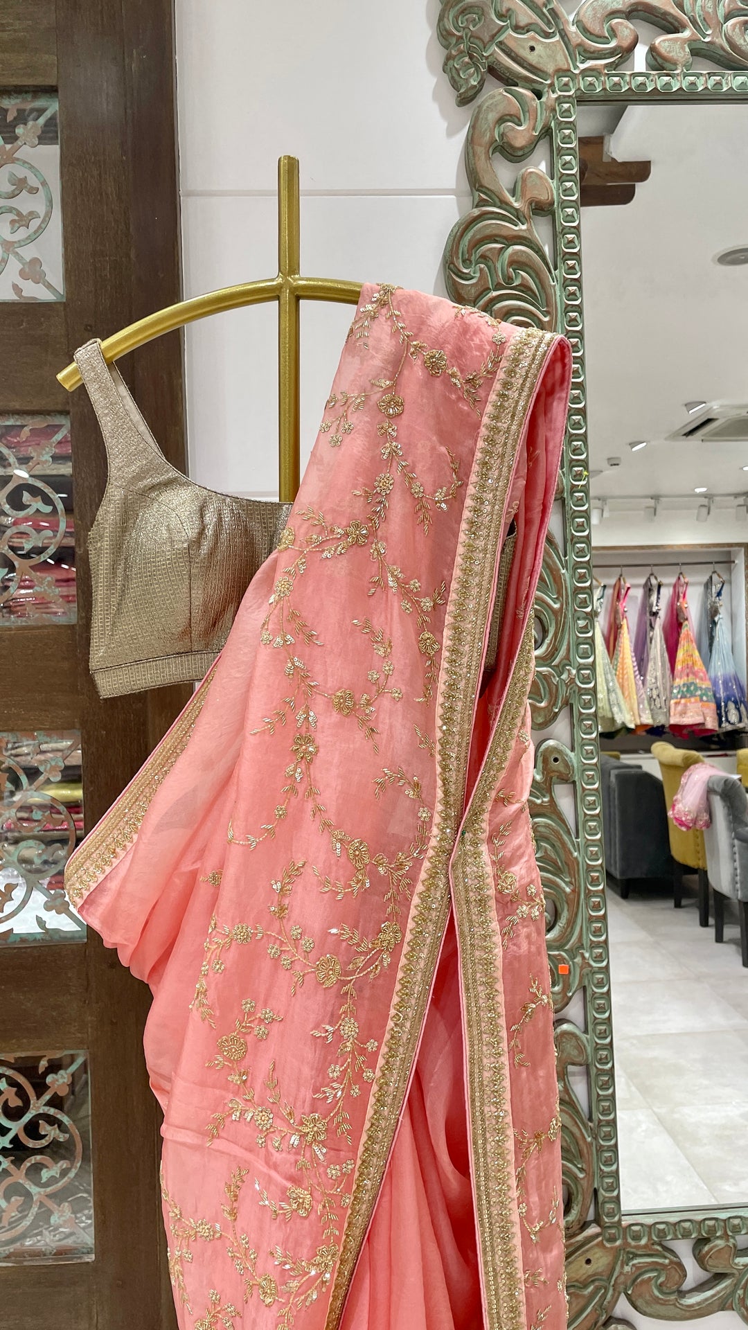 Pink Organza saree with gold embellishment