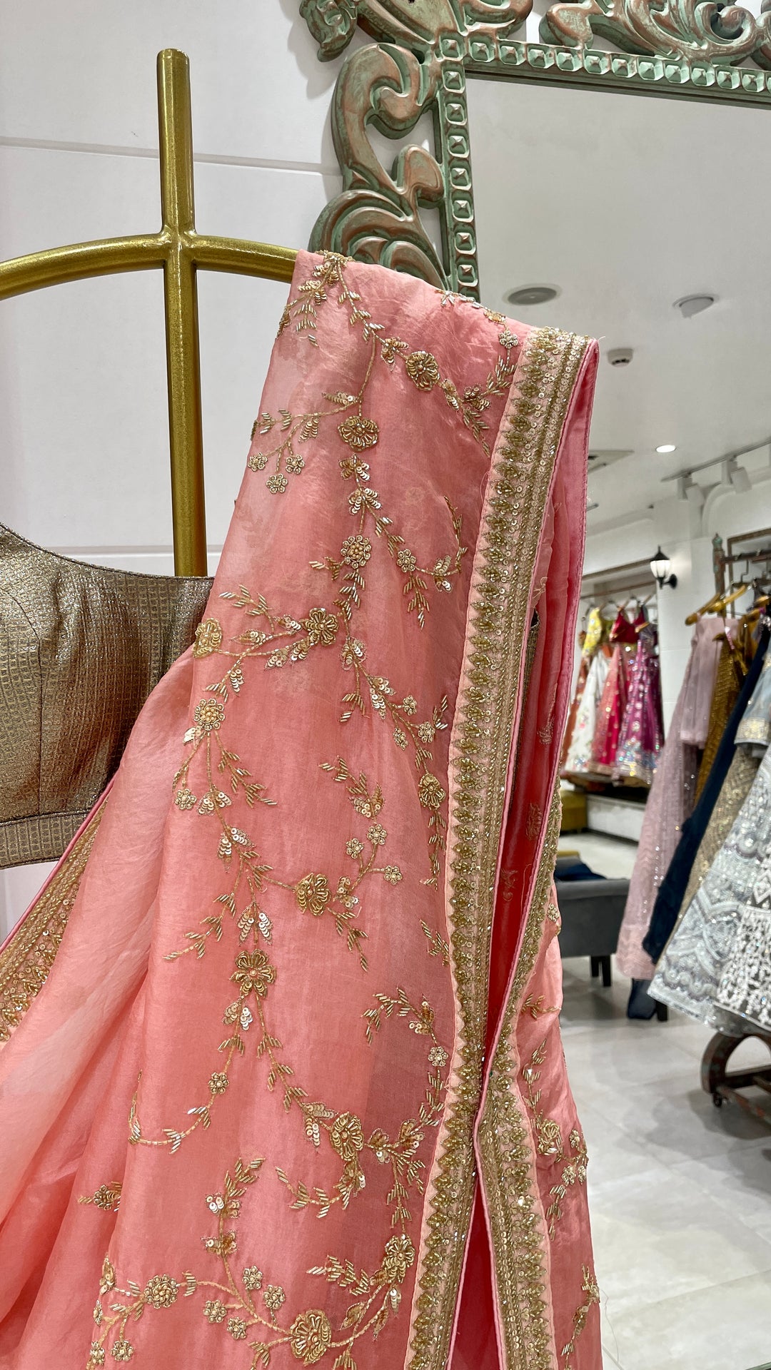 Pink Organza saree with gold embellishment