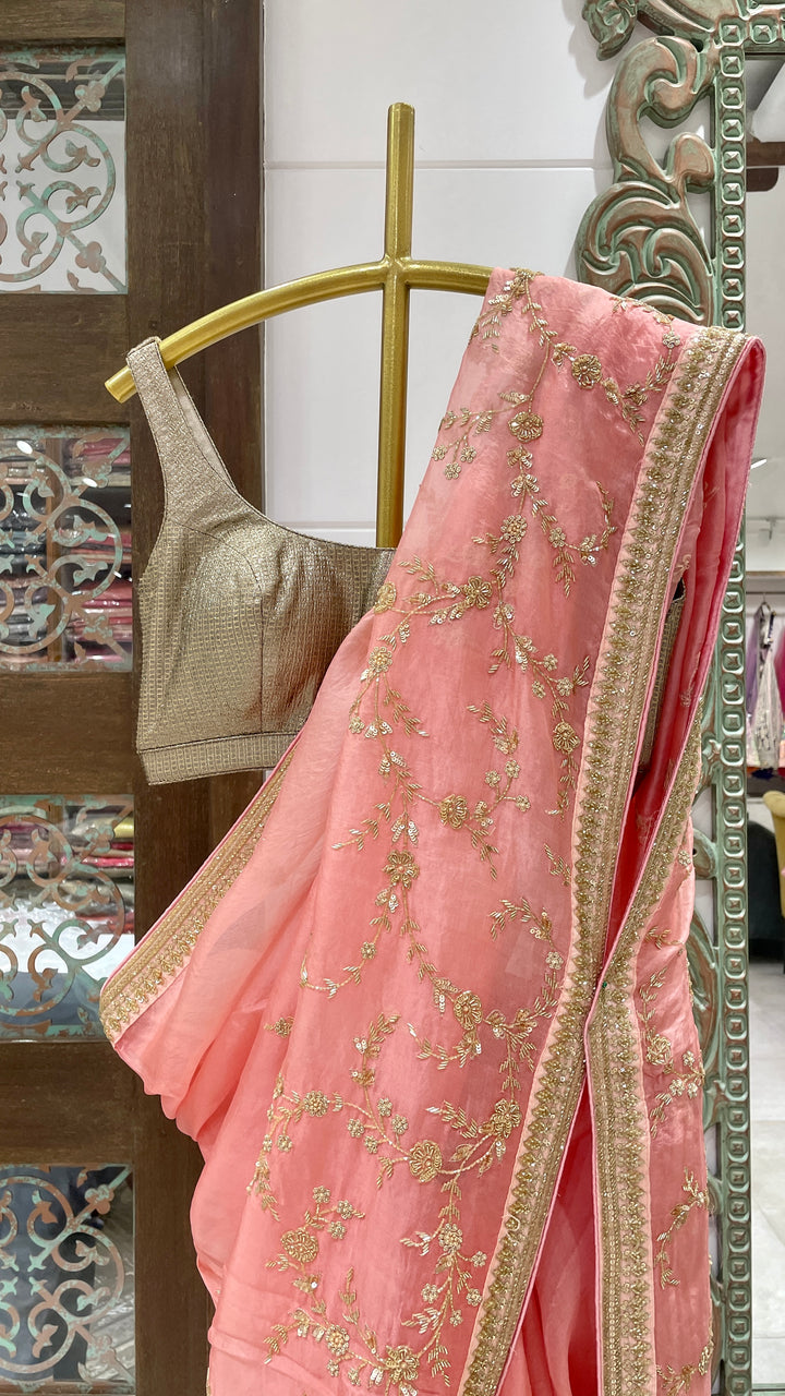 Pink Organza saree with gold embellishment