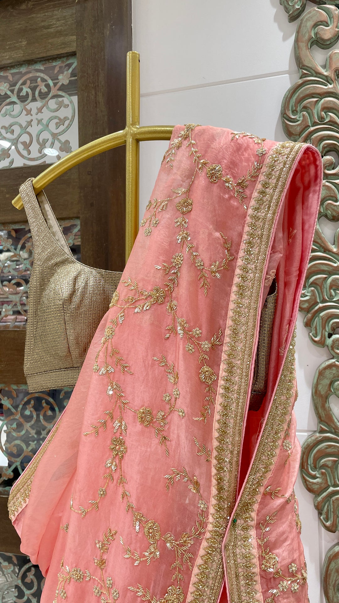 Pink Organza saree with gold embellishment