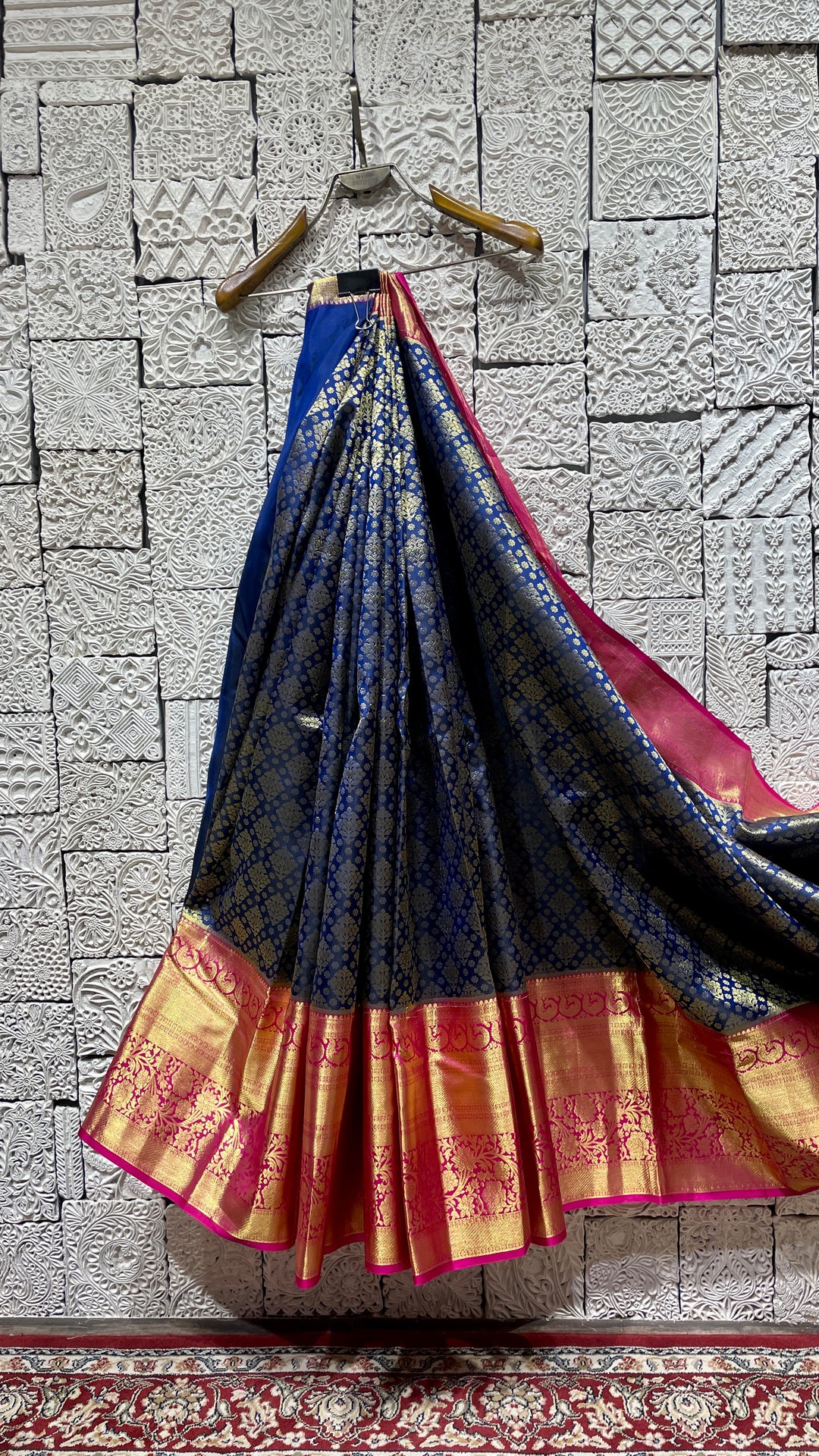 Blue silk kanjivaram saree with pink border