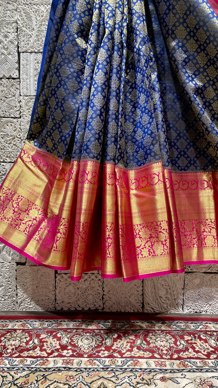 Blue silk kanjivaram saree with pink border