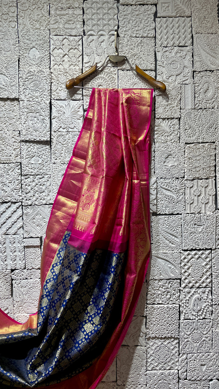 Blue silk kanjivaram saree with pink border