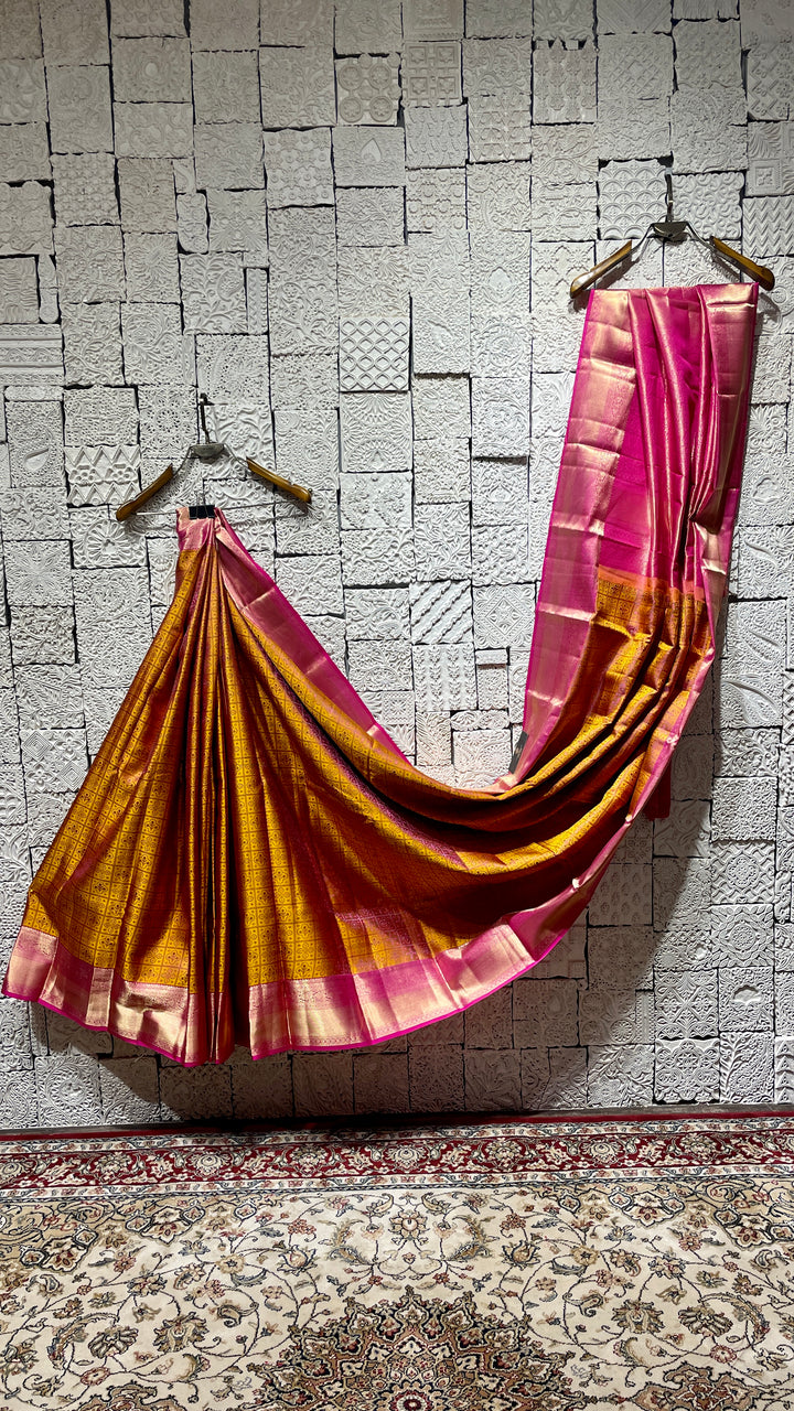 Mustard Silk kanjivaram saree with pink border