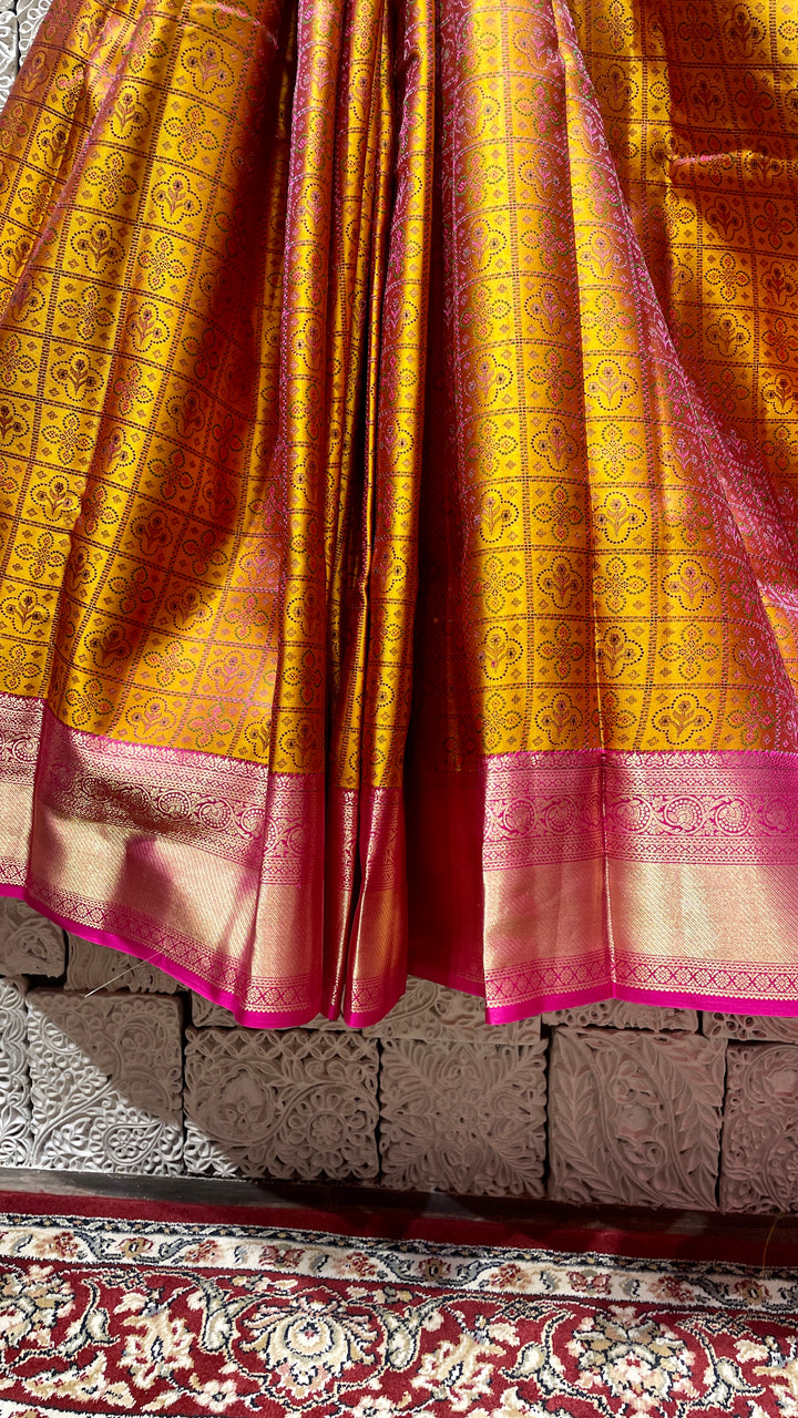 Mustard Silk kanjivaram saree with pink border