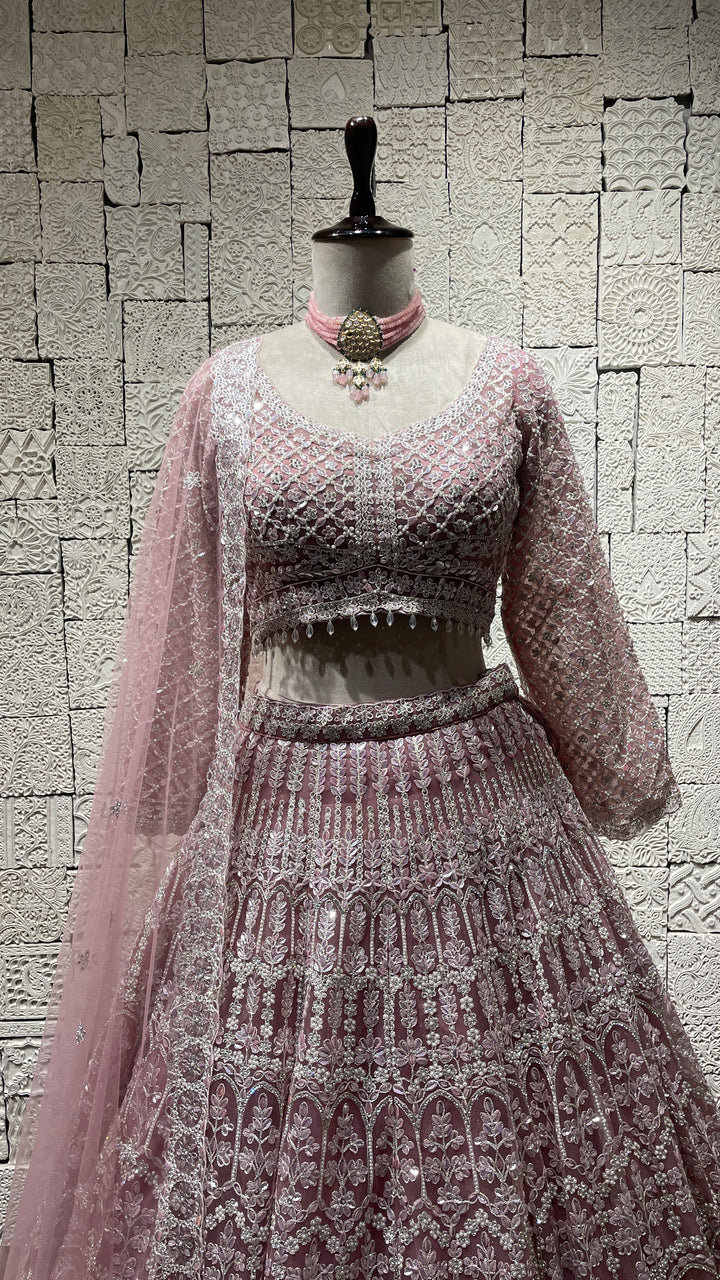 Pastel pink lehenga with sequins embellishments