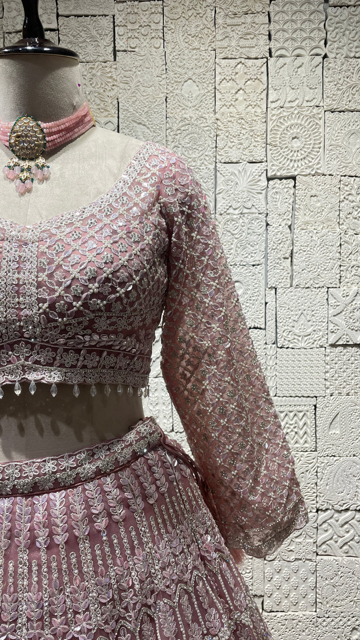 Pastel pink lehenga with sequins embellishments