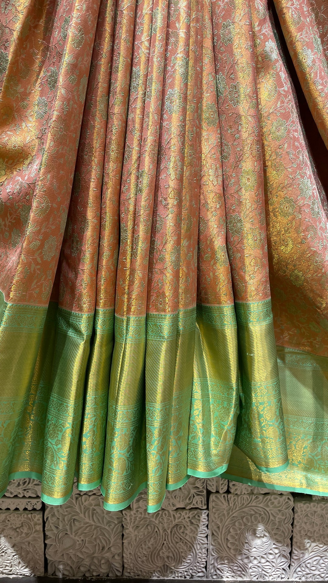 Pastel pink silk kanjivaram saree with green border