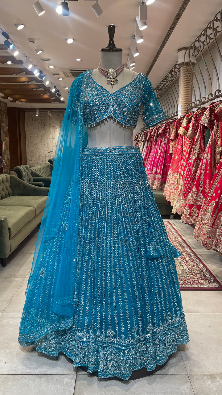 Blue net lehenga with mirrorwork