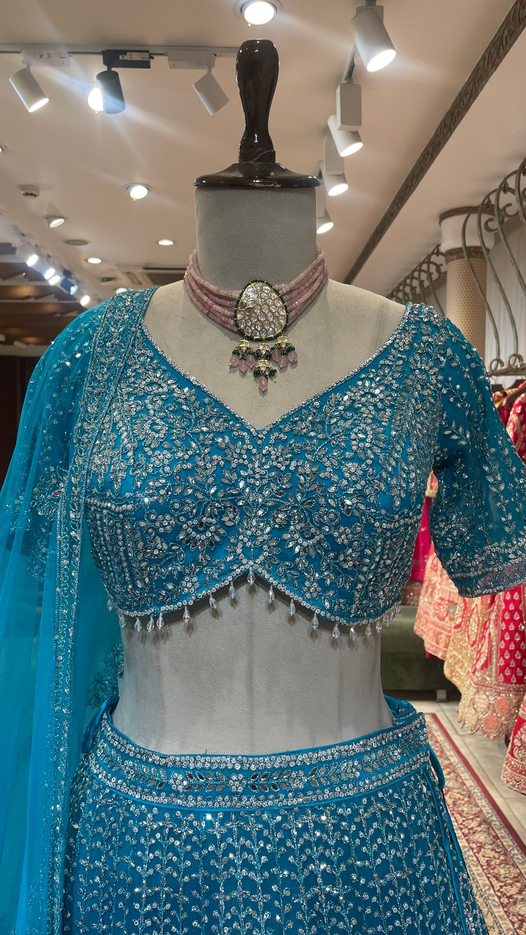 Blue net lehenga with mirrorwork