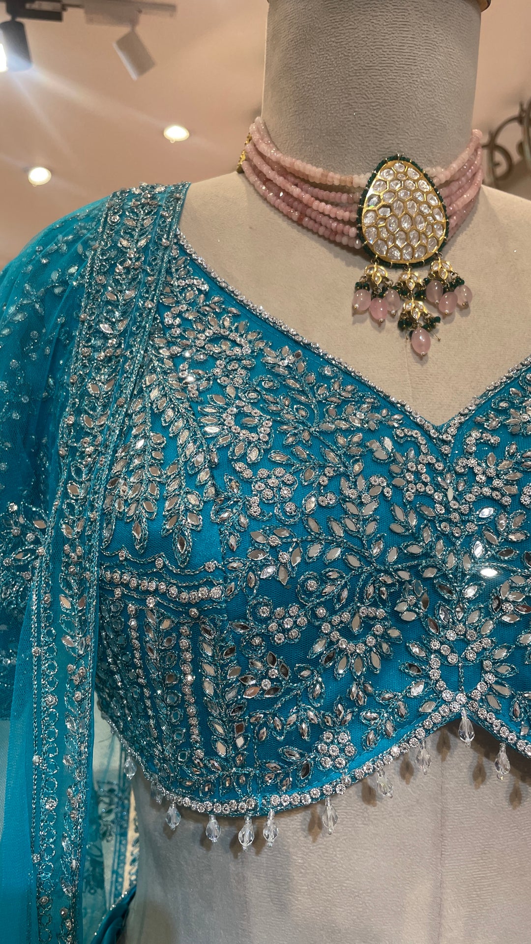 Blue net lehenga with mirrorwork