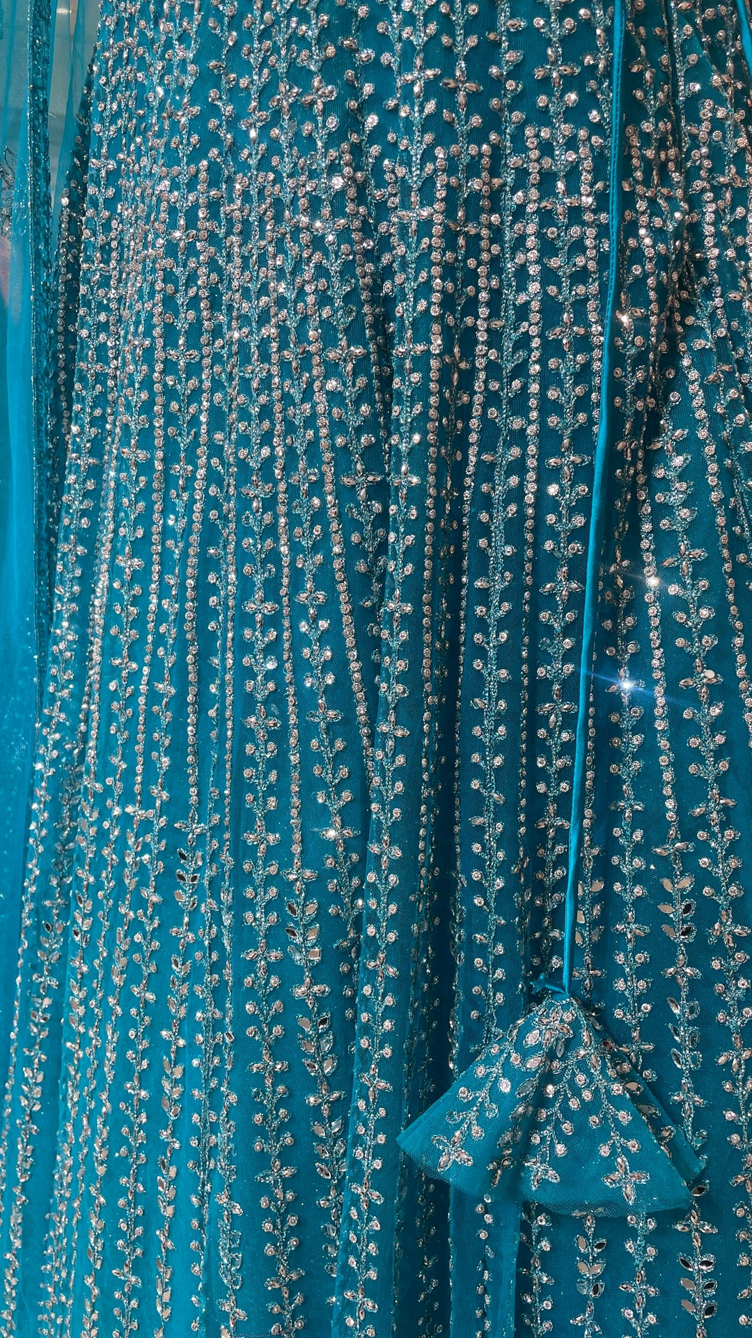 Blue net lehenga with mirrorwork