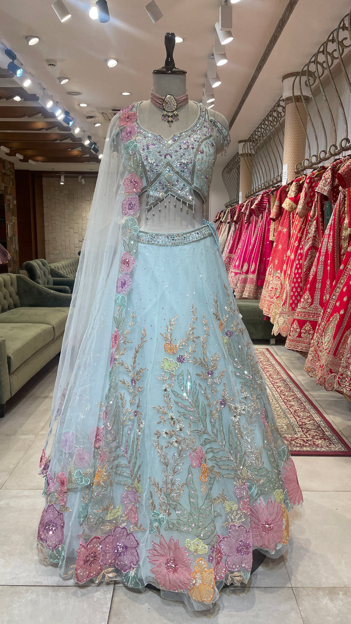 Pastel blue net lehenga with floral motifs