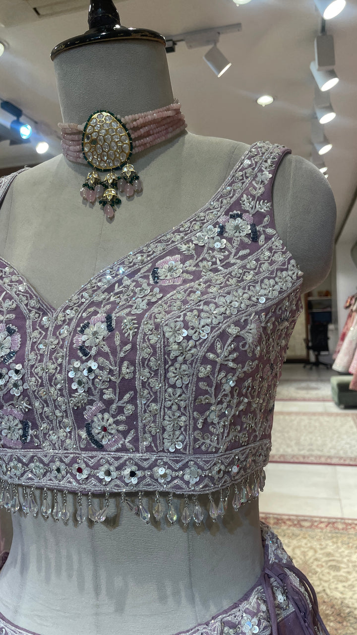 Lavender net lehenga with sequins cutdana and threadwork