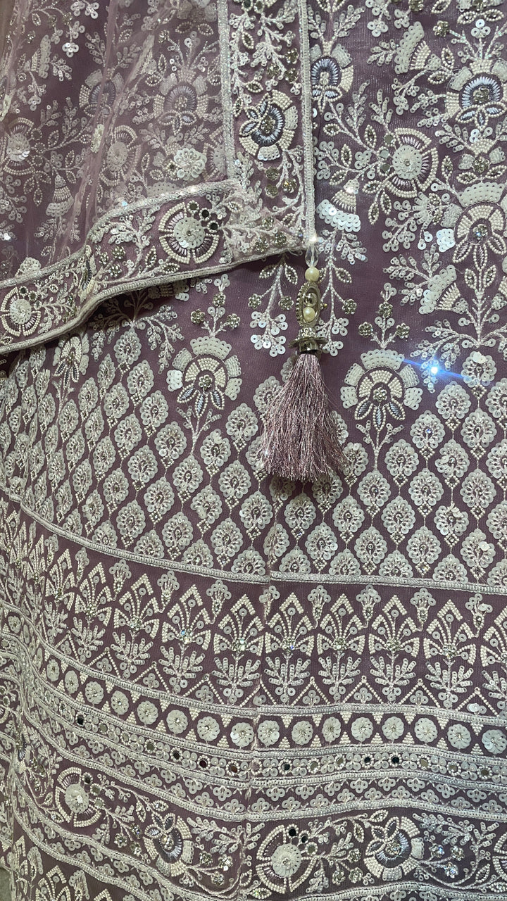 Lavender net lehenga with sequins cutdana and threadwork