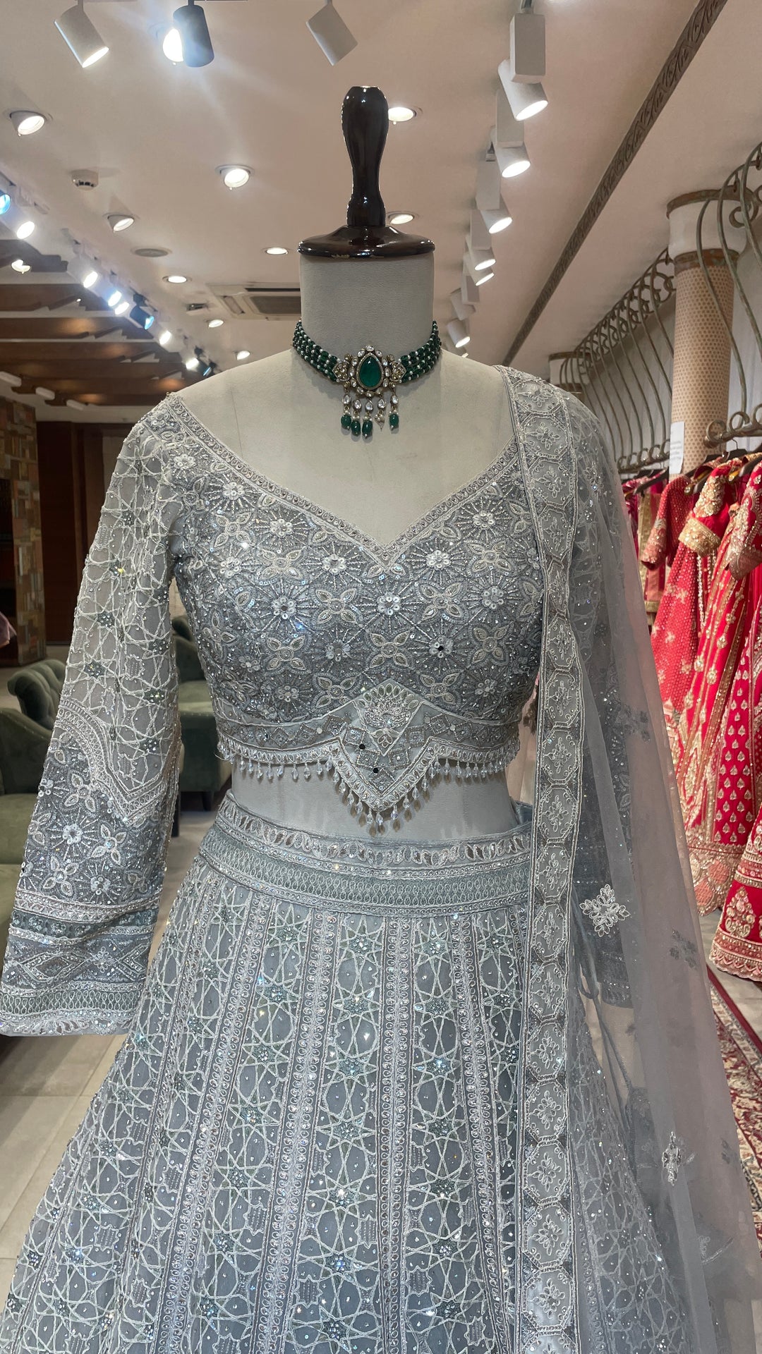 Grey net lehenga with sequin embellishments